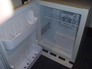 an empty white refrigerator with its door open at Hotel Excellence Kyoto Ekimae in Kyoto
