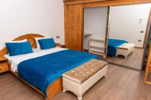 מיטה או מיטות בחדר ב-Utopia Hotel Baku