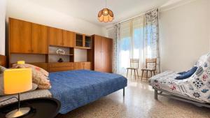 A bed or beds in a room at Zago