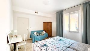 A bed or beds in a room at Zago