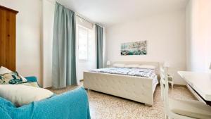 A bed or beds in a room at Zago