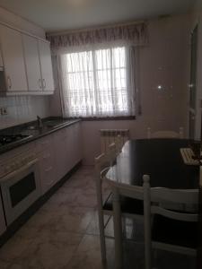 Fotografia z galérie ubytovania Apartamento en edificio nuevo con piscina, con vistas a la ría y al puerto, perfil familiar, no se admiten grupos de jóvenes v destinácii Sanxenxo
