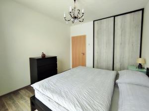 Posteľ alebo postele v izbe v ubytovaní Apartmány Říčky II.