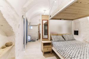 Posteľ alebo postele v izbe v ubytovaní Sotto Il Cielo Di Ostuni - Cassiopea by Halldis