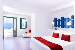 Ένα ή περισσότερα κρεβάτια σε δωμάτιο στο Avant Garde Suites