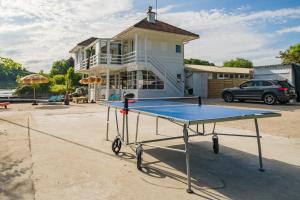 Stolný tenis v ubytovaní Villa California Dream proche paris et disney alebo v jeho okolí