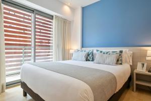 Postel nebo postele na pokoji v ubytování Lugaris Rambla Apartments