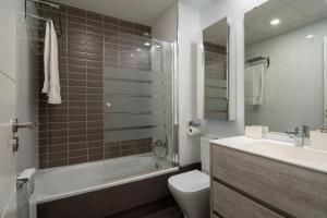 Kúpeľňa v ubytovaní GUNI SUITES JARDINEs