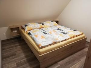 Posteľ alebo postele v izbe v ubytovaní Apartmány Říčky II.