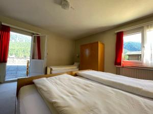 Postel nebo postele na pokoji v ubytování Hotel Restaurant Gommerhof