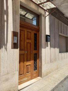 The facade or entrance of Casa Tortona