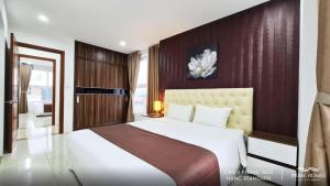 Ένα ή περισσότερα κρεβάτια σε δωμάτιο στο Căn hộ 3 phòng ngủ newlife bãi cháy