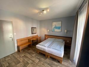 Posteľ alebo postele v izbe v ubytovaní Kalcit Tourist Motel