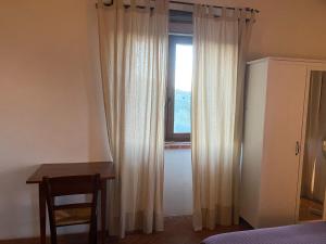 A bed or beds in a room at Agriturismo Podere Casella