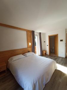 Postel nebo postele na pokoji v ubytování Hotel Cielo Blú