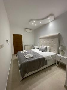 Łóżko lub łóżka w pokoju w obiekcie Villa Natka