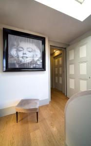 a living room with a couch and a table at Hotel Balestri - WTB Hotels in Florence