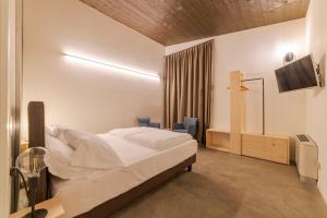 Agriturismo B&B Caffè e Vino客房内的一张或多张床位