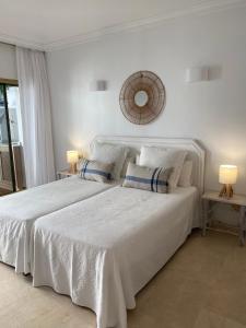 Postel nebo postele na pokoji v ubytování Precioso apartamento en primera línea de playa