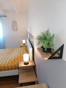 Łóżko lub łóżka w pokoju w obiekcie Appartement moderne entièrement rénové