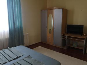 Una cama o camas en una habitación de Apartman Stanimirović