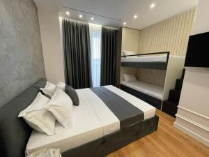 Voodi või voodid majutusasutuse HOTEL UJVARA toas