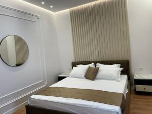 Voodi või voodid majutusasutuse HOTEL UJVARA toas