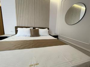 Voodi või voodid majutusasutuse HOTEL UJVARA toas