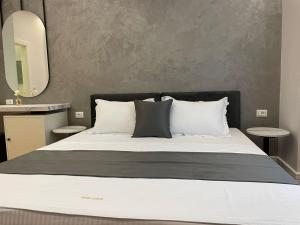 Voodi või voodid majutusasutuse HOTEL UJVARA toas