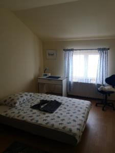 Una cama o camas en una habitación de Apartman Stanimirović