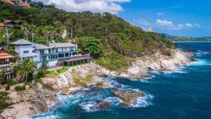 an aerial view of a house on a cliff next to the ocean at Villa Samayra - Super Luxury Villa Koh Samui in Chaweng