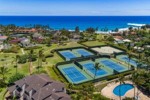 an aerial view of tennis courts at the beach at Koolkondo Luxury Designer Condo in Koloa