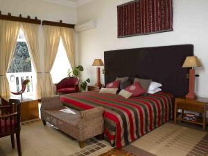 Cama o camas de una habitación en House of Waine