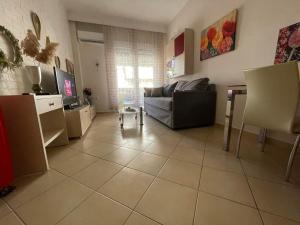 TV a/nebo společenská místnost v ubytování Brick Apartment
