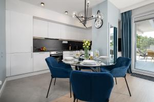 Η κουζίνα ή μικρή κουζίνα στο Morskie Apartamenty Albatros i Góral +12 φωτογραφίες