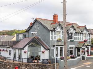 a building on the corner of a street at The Old Tywyn Post Office in Conwy