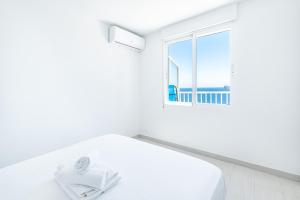 Postel nebo postele na pokoji v ubytování Penthouse Bella Vista