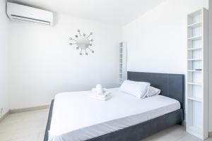 Postel nebo postele na pokoji v ubytování Penthouse Bella Vista