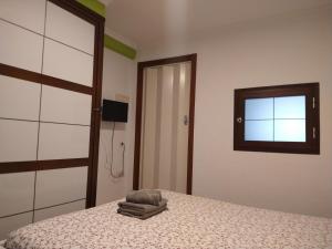 Posteľ alebo postele v izbe v ubytovaní Coqueto miniapartamento junto centro Torremolinos