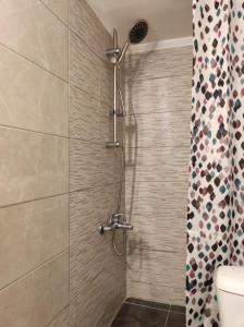 Kúpeľňa v ubytovaní Sea Pleasure Apartment II