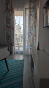 Posteľ alebo postele v izbe v ubytovaní Sea Pleasure Apartment II