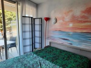 Postel nebo postele na pokoji v ubytování DINARD