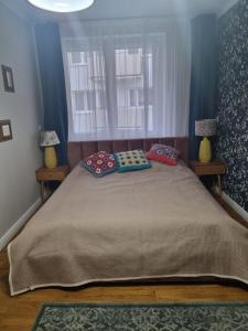 Posteľ alebo postele v izbe v ubytovaní Apartament Wojciecha 9B 2 - Gdynia Śródmieście 70m2