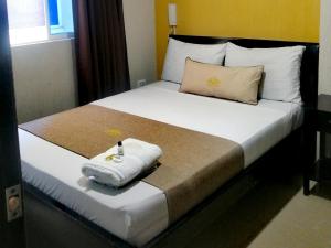 Uma cama ou camas num quarto em Hotel Chico Real
