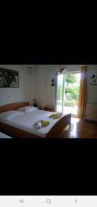 Fotografie z fotogalerie ubytování Comfortable rooms with small kitchen v destinaci Baćina