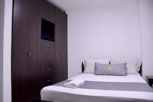 Uma cama ou camas num quarto em Hotel Chico Real