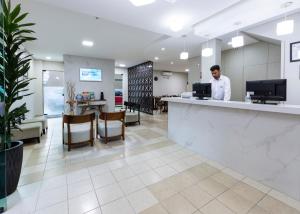 TV a/nebo společenská místnost v ubytování Hotel Pitol