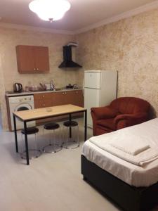 Kuchyň nebo kuchyňský kout v ubytování hotel amber