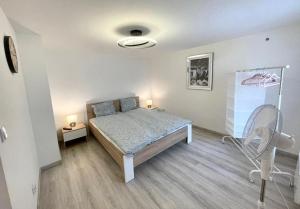 Posteľ alebo postele v izbe v ubytovaní B&J Apartament Międzyzdroje