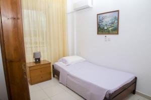 Postel nebo postele na pokoji v ubytování Aggeli Village House